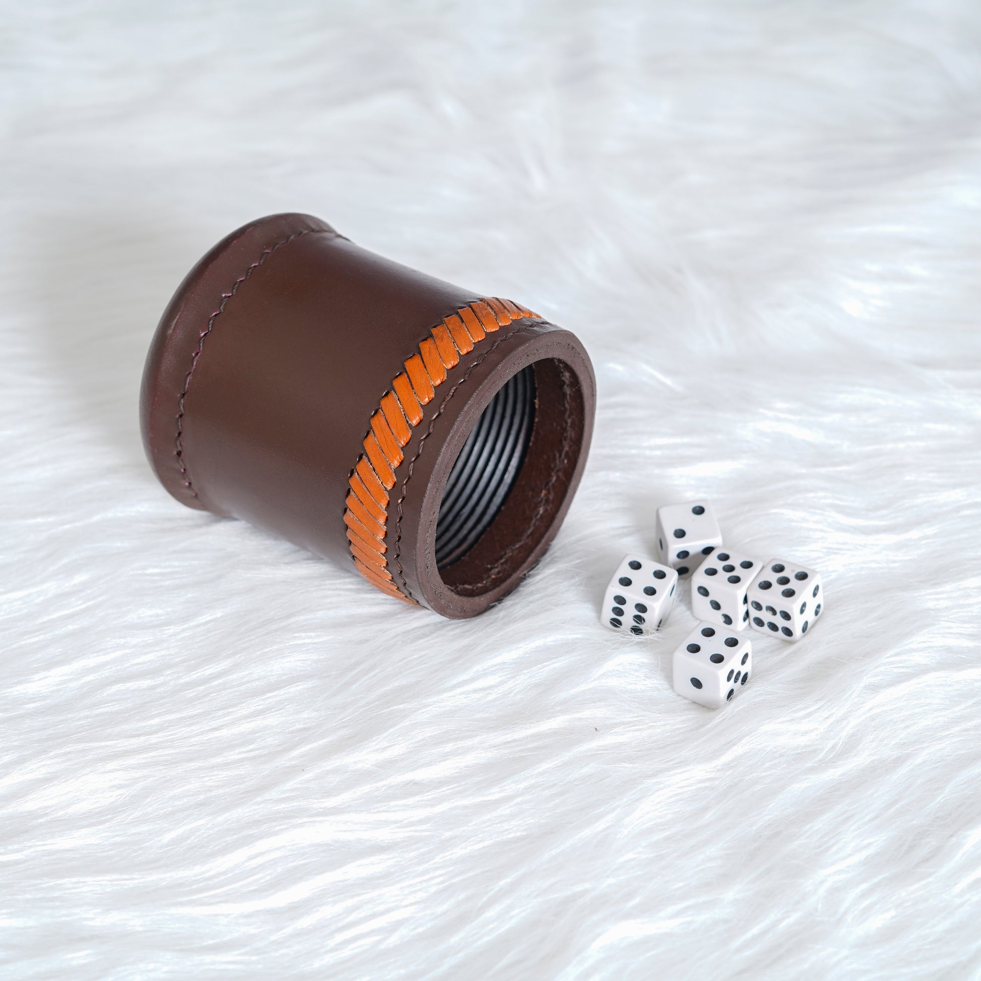 dice cup, cup, black dice cup, orange dice cup, leather dice cup, leather black dice cup, leather orange dice cup, black & orange leather dice cup, liar's leather dice cup